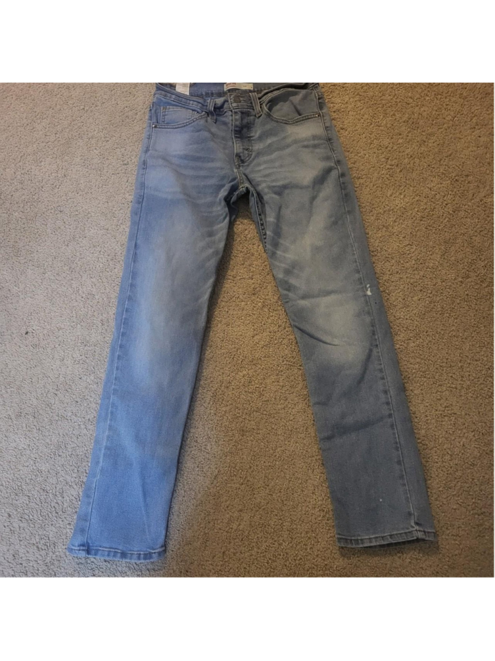 Levi's light wash blue denim slim mens jeans 28×30 - has small bleach stain as s